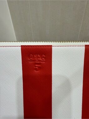 NWOT Striped Pouch with Embossed Logo and Number